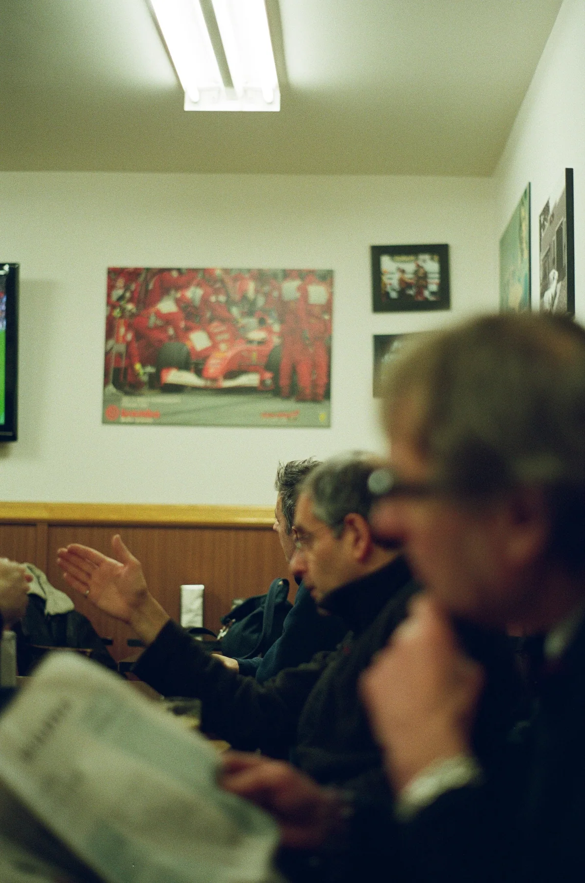 People gathered around a table in a warmly lit room