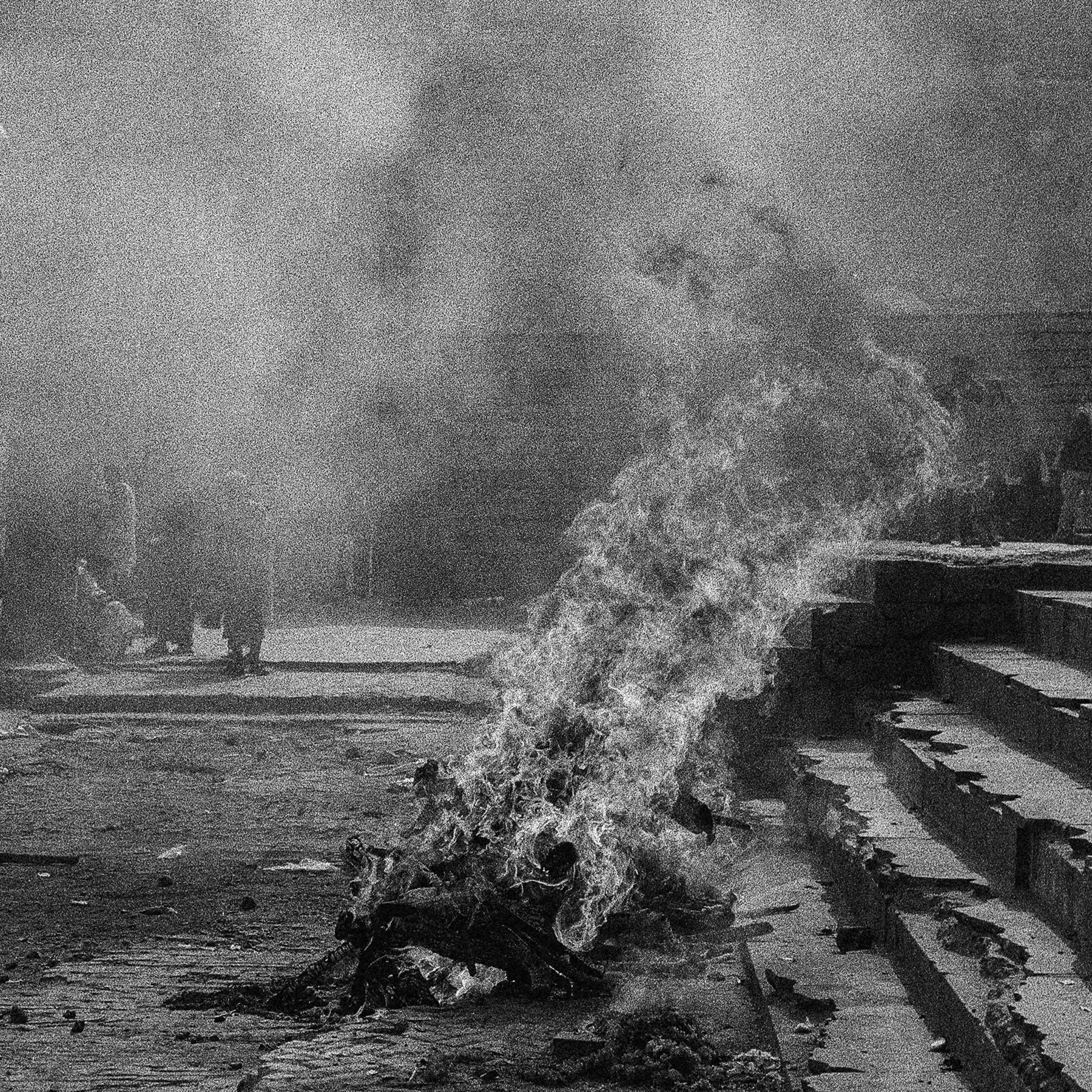 Smoke drifting across a set of outdoor steps