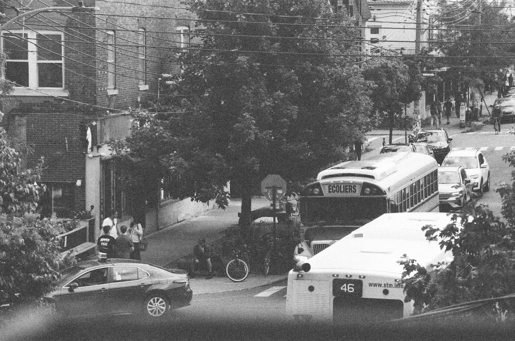 An elevated black-and-white view of a residential street